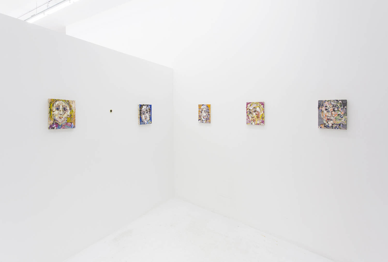 VP Install wall of small paintings.jpg